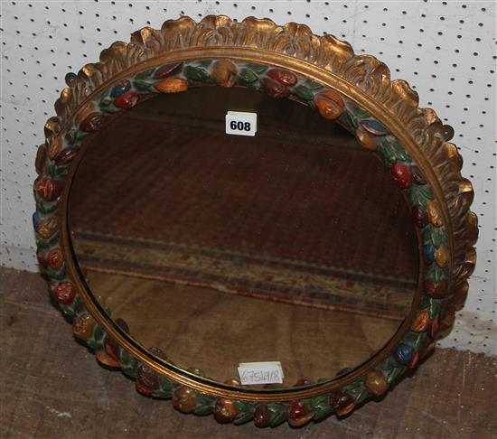 Circular gilt and polychrome framed wall mirror